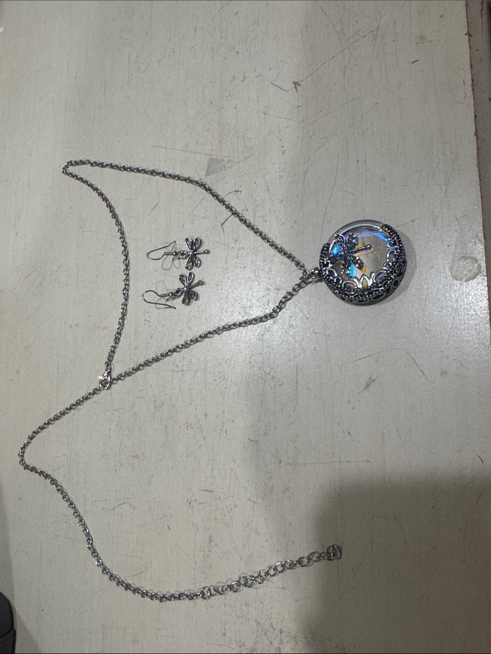 Silver Floral Pendant Necklace and Earrings Set with Blue Accents